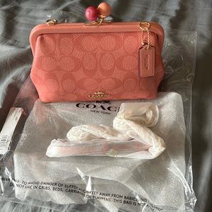 NWT Coach Nora kisslock clutch/shoulder bag.